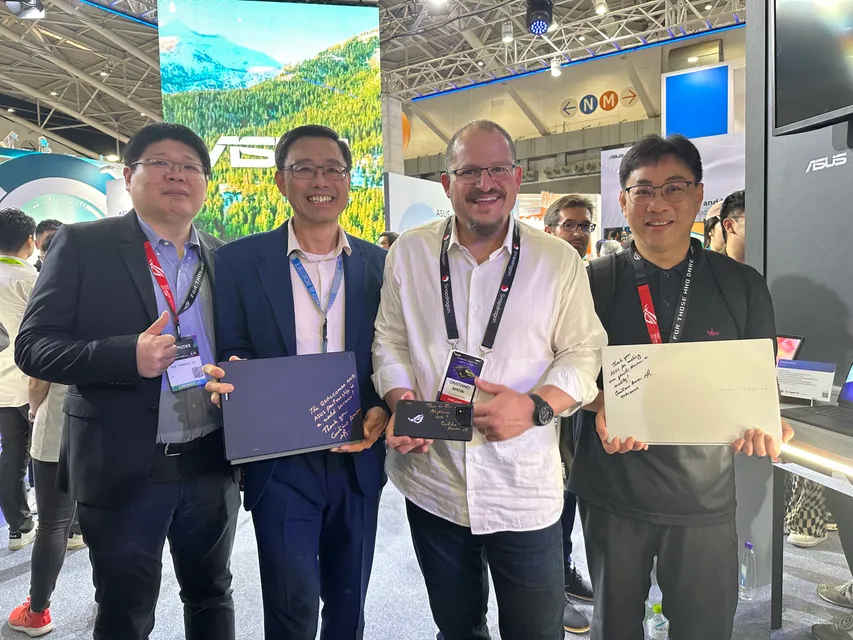 1. Qualcomm Ceo Cristiano Amon Meets Asus Co Ceo S.y. Hsu and Signs Some Asus Products During His Visit to the Asus Booth at Computex 2024.